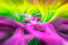 Abstract Dynamic Twirl Effect With An Advantage Of Yellow, Green And Pink