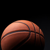 Fototapeta Sport - basketball on a black background