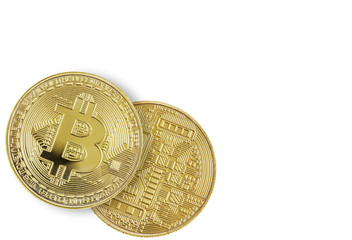 Two golden bitcoins on white background