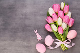 Fototapeta Tulipany - Mother's Day, woman's day, easter, pink tulips, presents on gray  background.