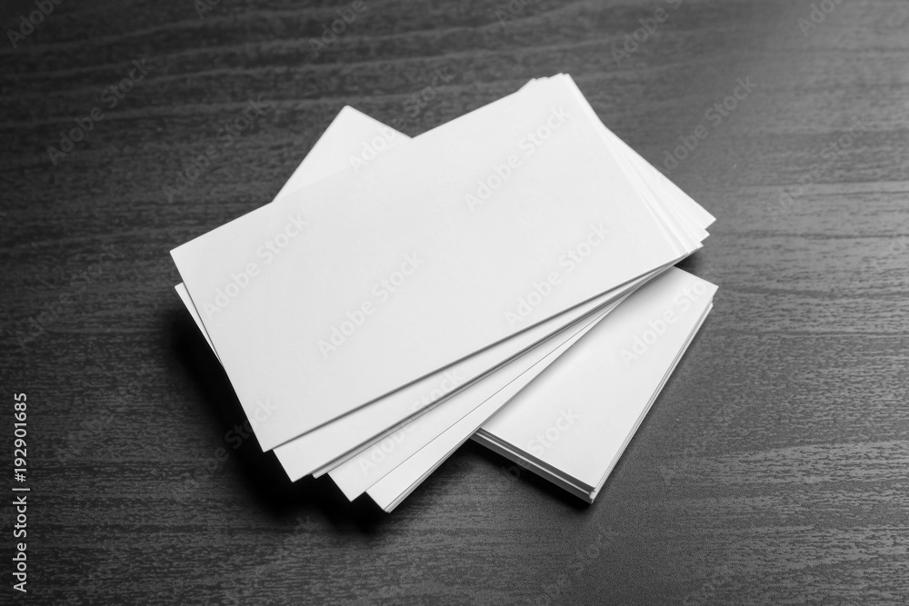 Blank business cards on dark background