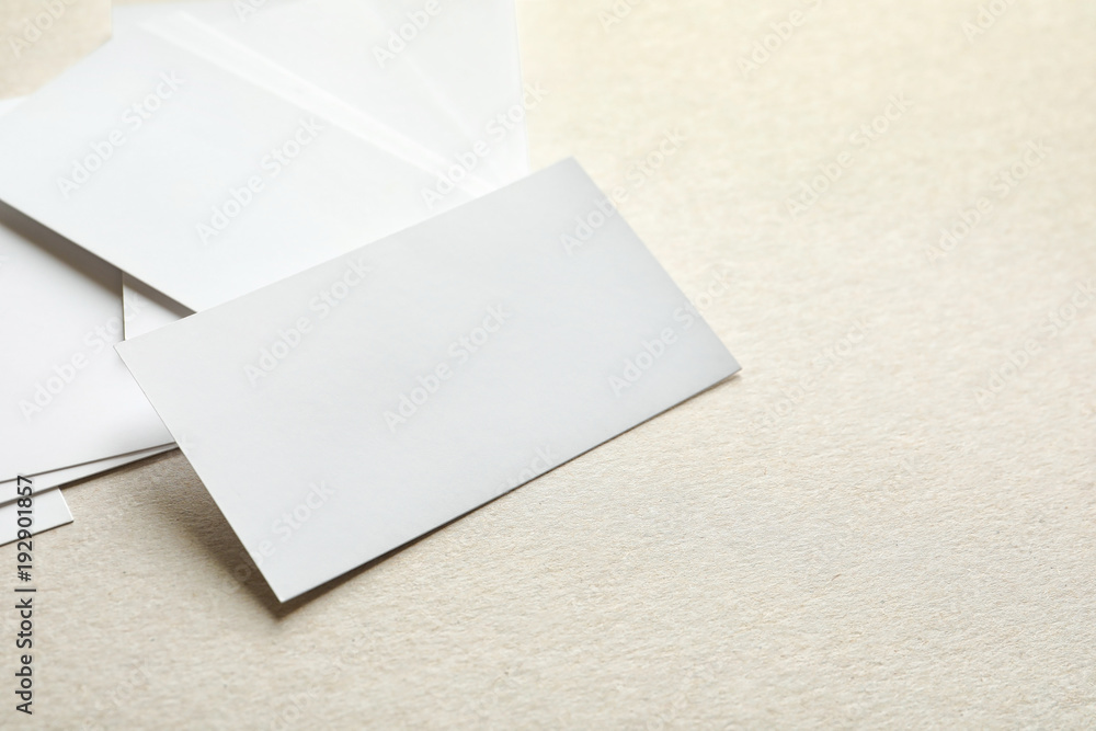 Blank business cards on light background