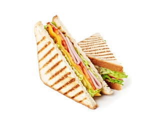 Wall Mural - Sandwich with ham, cheese, tomatoes, lettuce, and toasted bread. Above view isolated on white background.