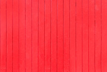 Old, Red Grunge Wood Vertical Panels On A Rustic Barn