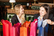 © jev - Adorable student girls relaxing on a holidays after shopping