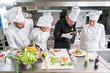 © Senad - Chef Cooking, Cutting and preparing next plate