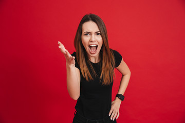 Sticker - Portrait of an angry girl shouting at camera