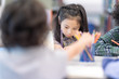 © Nattanon - In selective focus of Happy Children Learning Class in Library. Development of Human Resources in Education Concept.