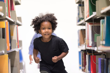 Happy kids lifestyle in the Library. Young people explore lifestlye in the Library. Development of Human Resources in Education Concept. Setup studio shooting.