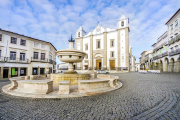 Canvas Print - Giraldo Square with fountain and Saint Anton's church, Evora, Alentejo, Portugal