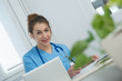 © Philipimage - portrait of young nurse in blue uniform
