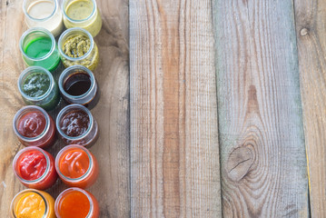 Canvas Print - Assortment of sauces in the glass jars