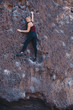 © Alexandra Phillips - Blonde Woman Enjoying Bouldering Outside