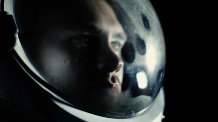 Wall Mural - portrait shot of the courageuos astronaut wearing helmet in space, looking around in wonder. space t