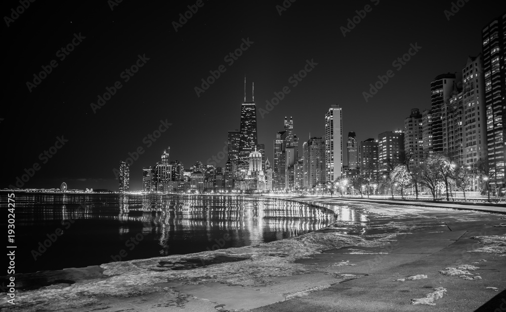 Big city skyline on water at night - obrazy, fototapety, plakaty 
