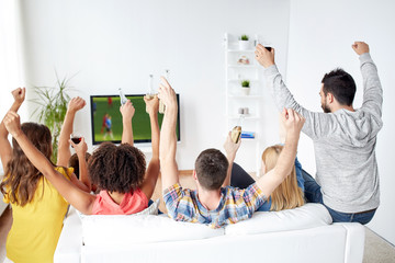 Poster - friends watching soccer on tv and celebrating goal