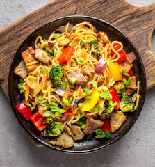 Wall Mural - Plate of noodles with meat and vegetables