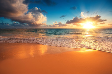 Wall Mural - beautiful sunrise over the sea. tropical beach.