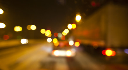 Wall Mural - View of blurred road with lots of cars and light from the driver's eyes