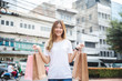 © kapturephoto - Young asian lady shopping