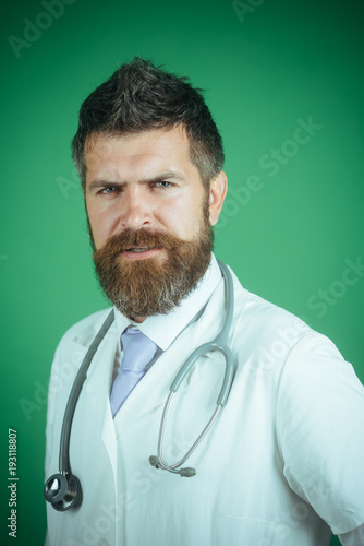 Physician With Beard Dressed In White Medical Robe Medicine And