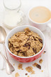 © Natalia Mylova - cereals with chocolate cereals in red bowl