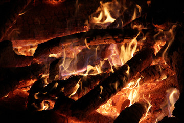 Closeup Bonfire -wood burning and flames  - black background