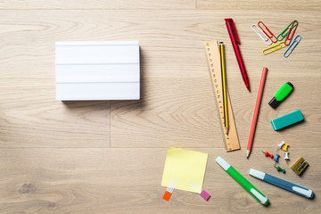 Wall Mural - Blank lightbox with copy space on desk from above