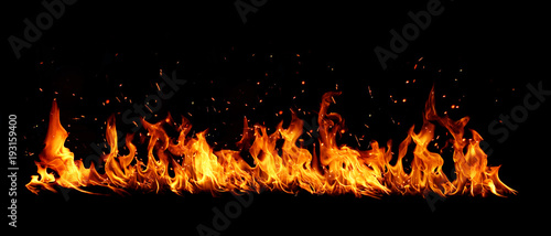 Blazing flames over black background Tableau sur Toile