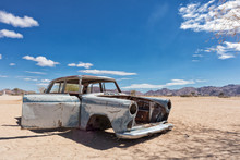 Old And Abandoned Car In The Desert Of Namibia, Spot Known As Solitaire.
