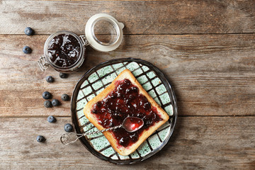 Wall Mural - Delicious toast with sweet jam on plate