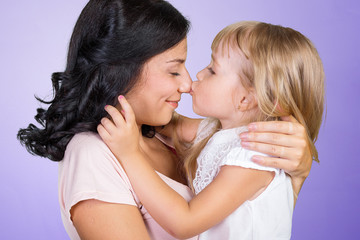 Happy mother and child girl