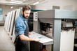 © rh2010 - Printing operator working with offset machine at the printing manufacturing