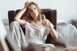 © zinkevych - What should I do. Confused stressed woman trying to solve her problem and drinking white wine at home.