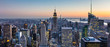 New York City. Manhattan downtown skyline with illuminated Empire State Building and skyscrapers at dusk. USA.