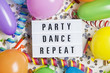 © ink drop - Party celebration background with party dance repeat message on a lightbox