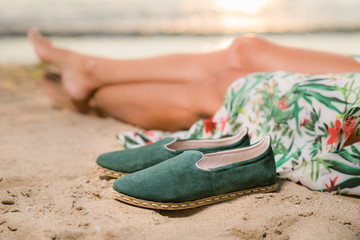 Shoes off on the beach