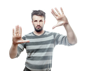 Wall Mural - Magic trick. Photo portrait of a young european man showing both of his opened palm. Isolated on white background with clipping path.