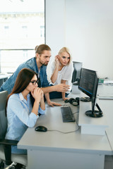 IT office. People Working At Open Workplace