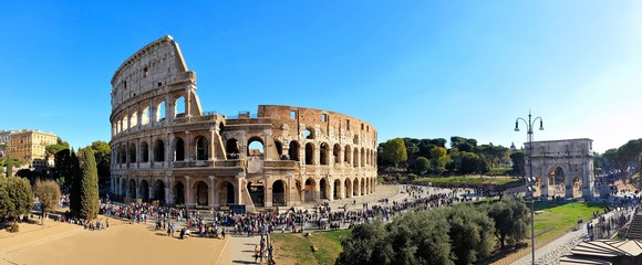 Wall Mural - Rome, Italy panorama overlooking the ancient Coliseum and the Arch of Constantine