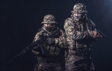 Elite Squad Soldiers With Weapons And Ammunition