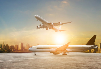 Canvas Print - jet plane flying over runways and beautiful dusky sky with copy space use for air transport ,journey and traveling industry business