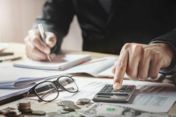 Fototapete - accountant working in office. business finance and accounting concept