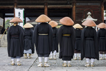 Buddhist Monks Looking At The Sanmon Gate In Zenko-ji, A Buddhist Temple Located In Nagano, Japan
