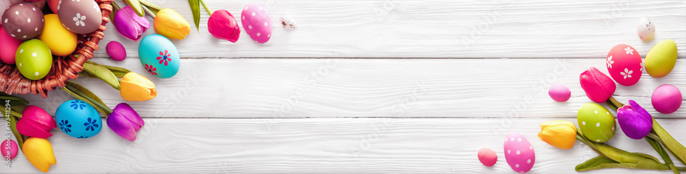 Easter Eggs with Flowers on White Wooden Background - obrazy, fototapety, plakaty 