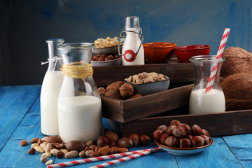 Wall Mural - Alternative types of milks. Vegan substitute dairy milk with nuts