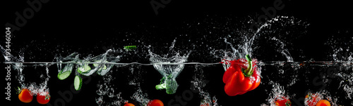 group of vegetables in water splash © producer