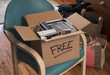 © kentannenbaum46 - cardboard box marked free with CDs and DVDs on home table