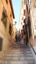 Toledo Narrow Street With A Ladder. Travel Spain.
