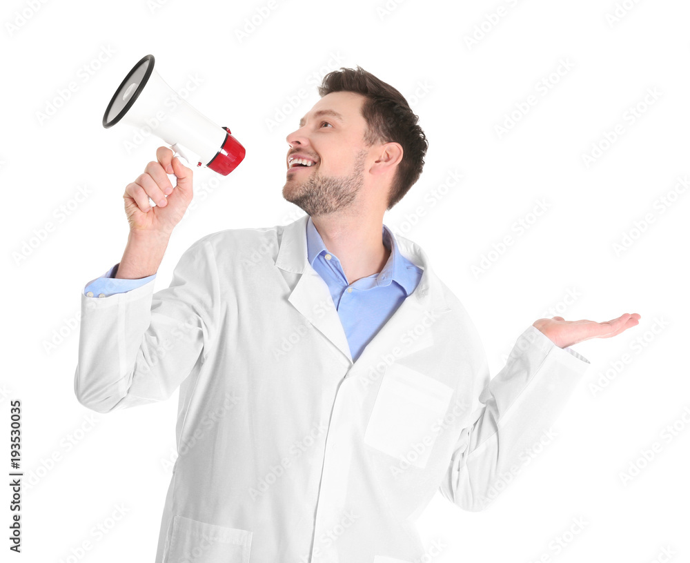 Male doctor with megaphone on white background
